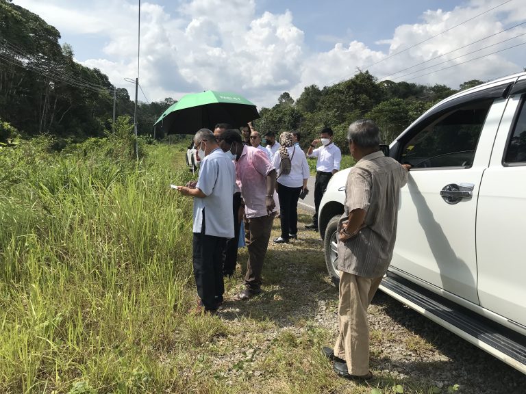 Visit to the graveyard of a new Catholic church in the Majau area, Kanowit